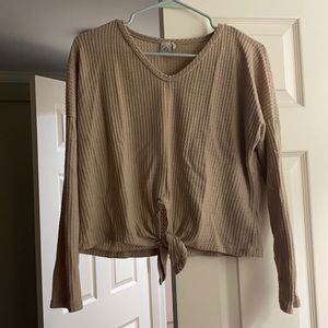 Long sleeve knit shirt w/ tie front. Warm and comfortable material!